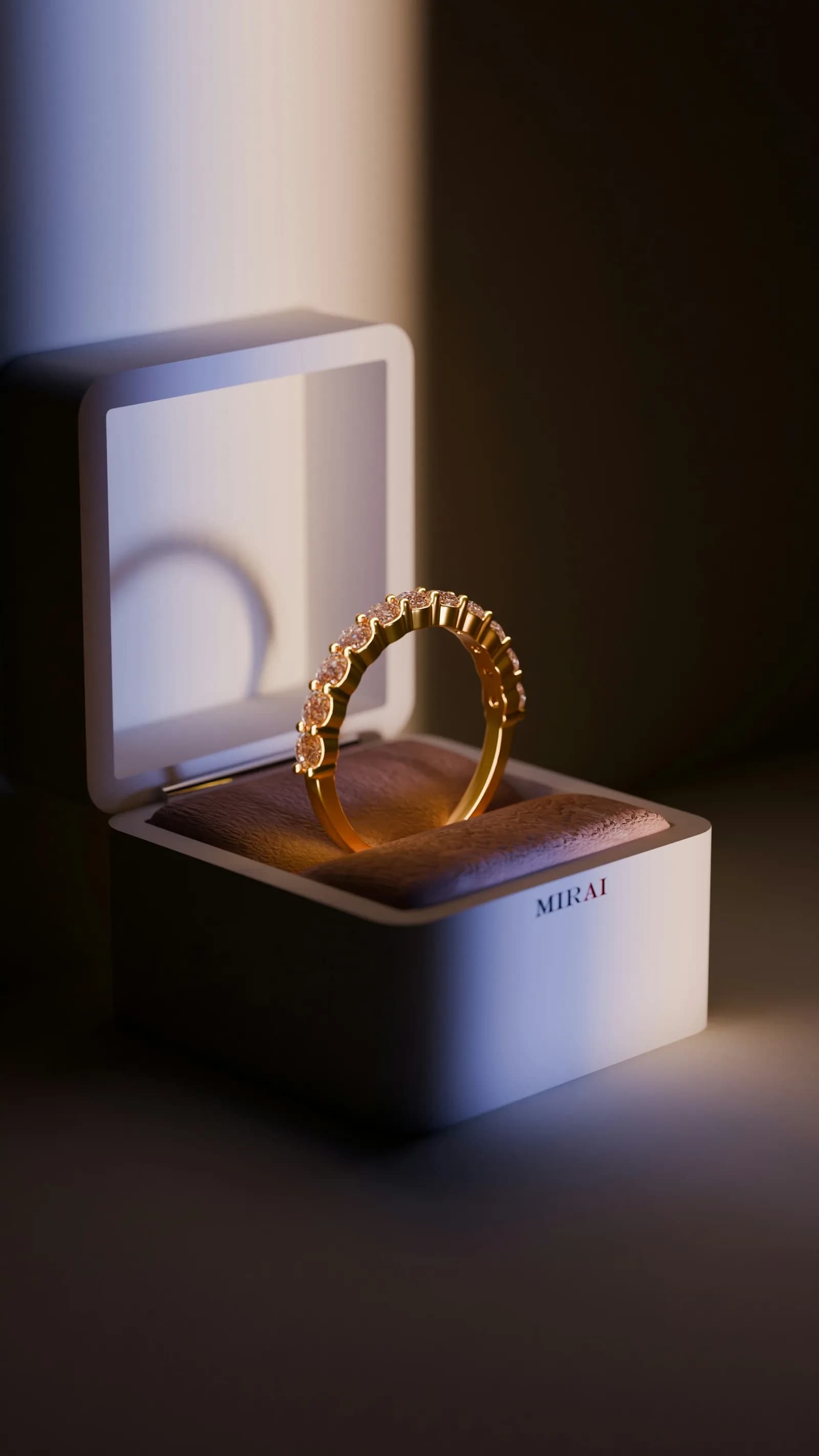 Cocktail Rose Gold Ring - A gold ring sitting on top of a white box